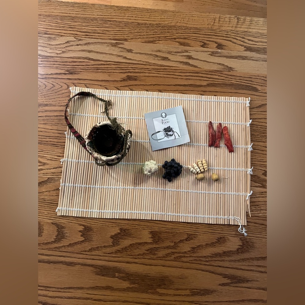 American Girl Kaya's food set (Trading Feast & Tule Mat).Retired in 2016.